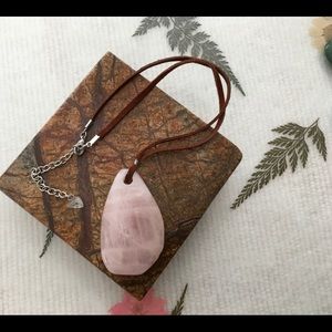 Rose quartz pendant on leather chain